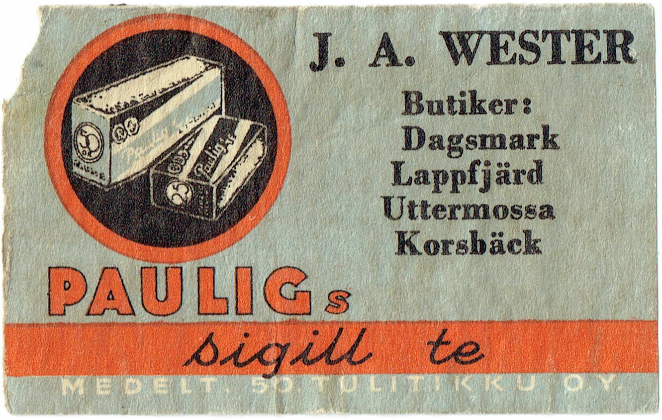 På denna tändsticksask med Pauligs reklam så ser vi att Wester hade 4 butiker i Lappfjärd.